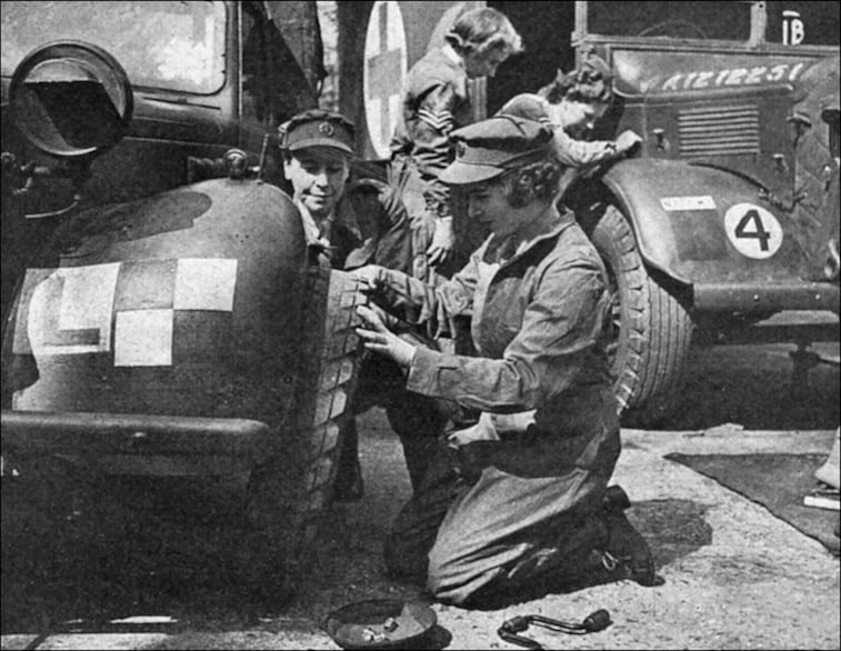 Princess Elizabeth changing a car tire