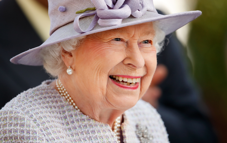 Queen Elizabeth II smiling for the camera