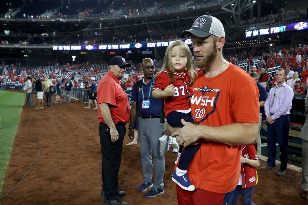 Stephen Stasburg holding his daughter