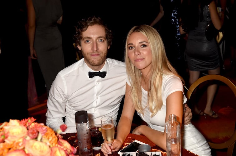 Thomas Middleditch and Mollie Grant at a table at an Emmys after party