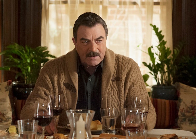 Tom Selleck as Frank on Blue Bloods sitting at the dinner table