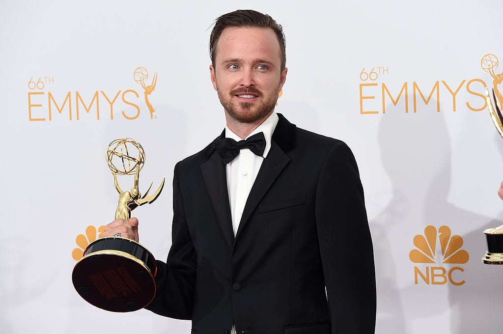 Aaron Paul, winner of Outstanding Drama Series Award and Outstanding Supporting Actor in a Drama Series Award for "Breaking Bad" poses in the press room during the 66th Annual Primetime Emmy Awards.