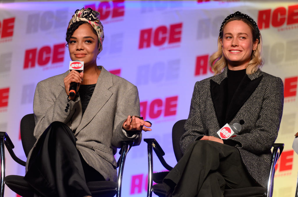 Tessa Thompson and Brie Larson attend ACE Comic Con Midwest on October 12, 2019