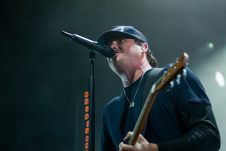 Tom DeLong performs onstage