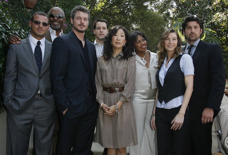 The cast of Grey's Anatomy posing for a photo