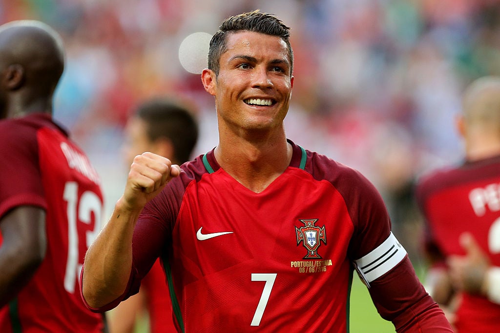 Portugals forward Cristiano Ronaldo celebrates after scoring a goal.