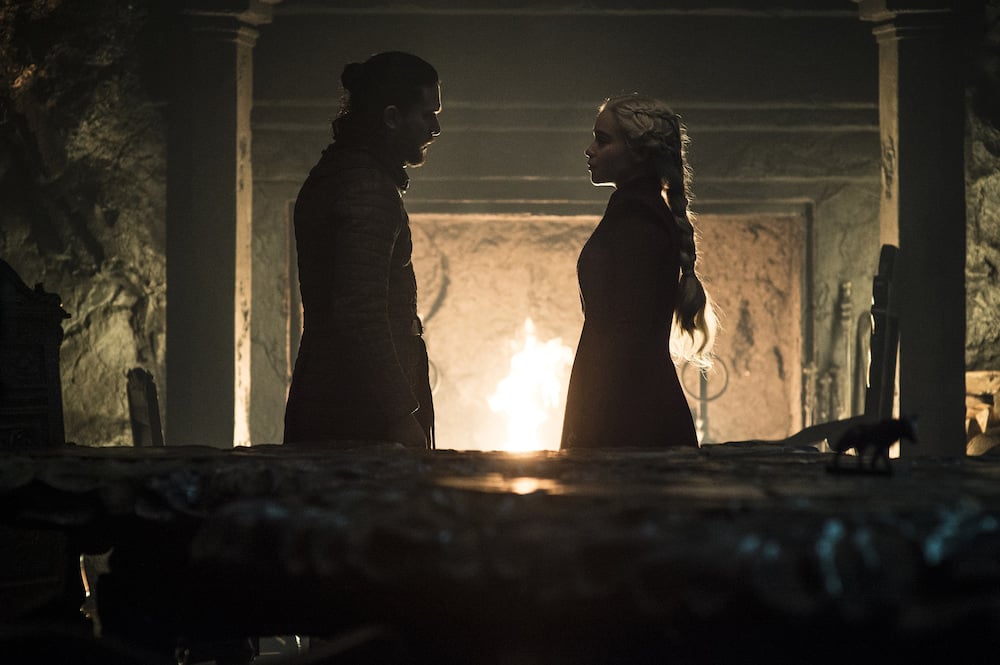 Daenerys and Jon talk in front of a fireplace (Episode 5, 'Game of Thrones").