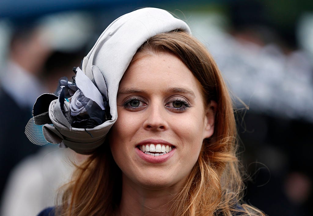 Princess Beatrice smiles during a garden party held at Buckingham Palace.