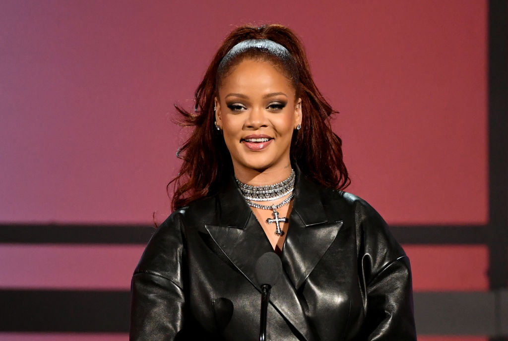 Rihanna speaks onstage at the 2019 BET Awards.