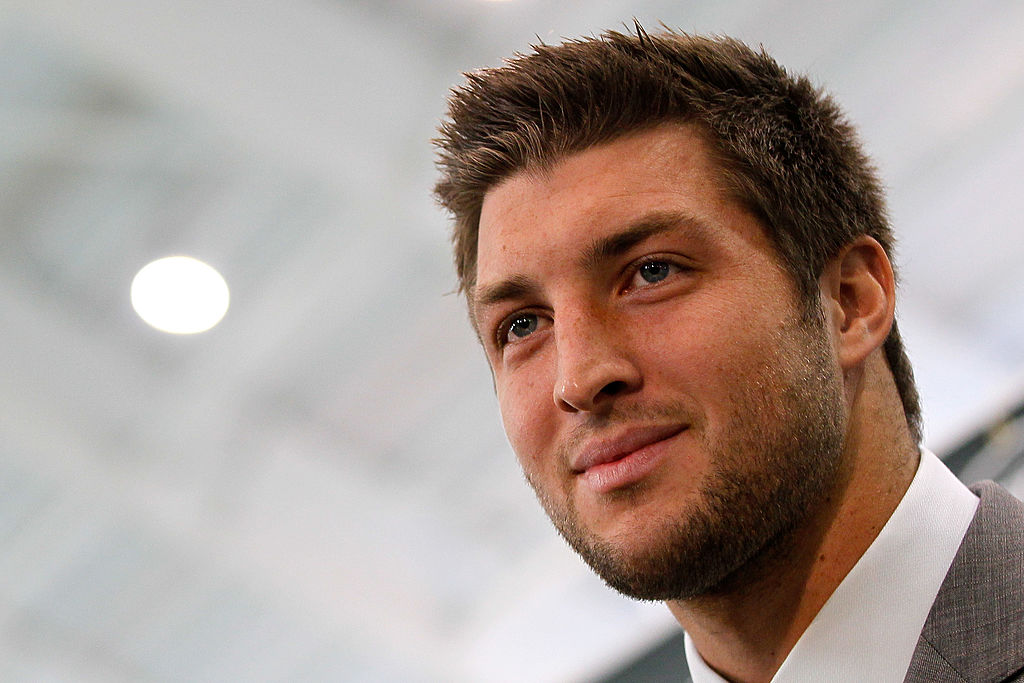 Tim Tebow addresses the media as he is introduced as a New York Jet at the Atlantic Health Jets Training Center in 2012.