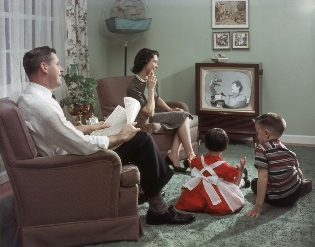 A 1950s family watching tv 