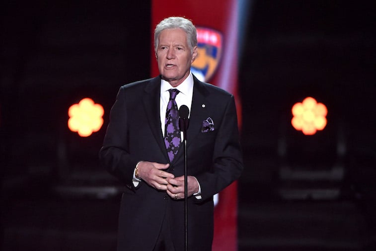 Alex Trebek speaks onstage