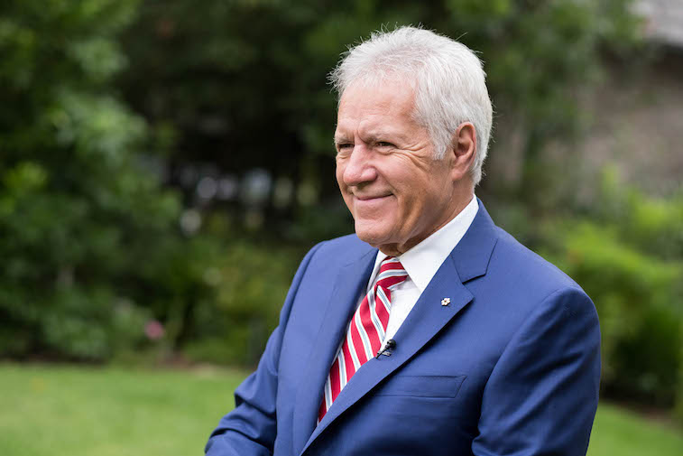 Alex Trebek smiles for the camera