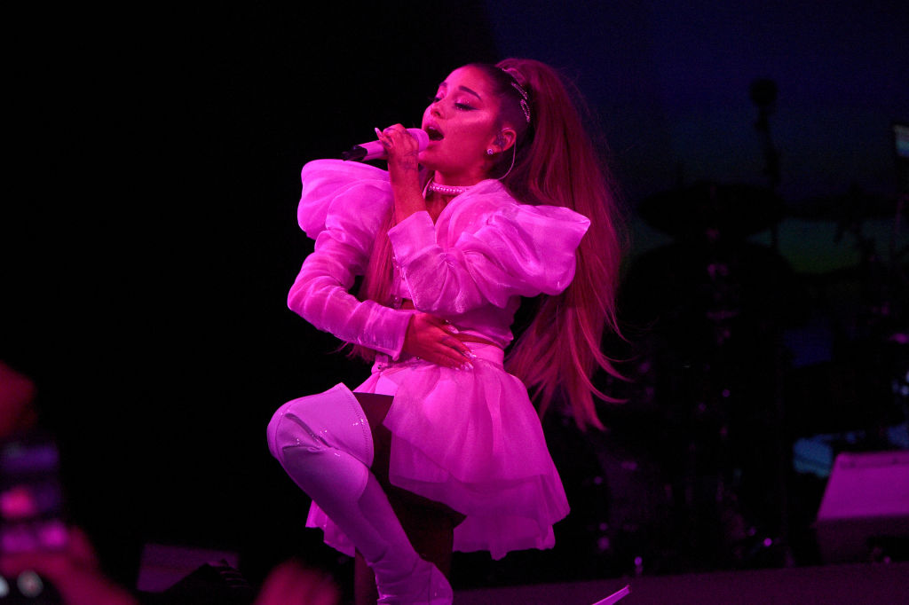 Ariana Grande performs live on tour