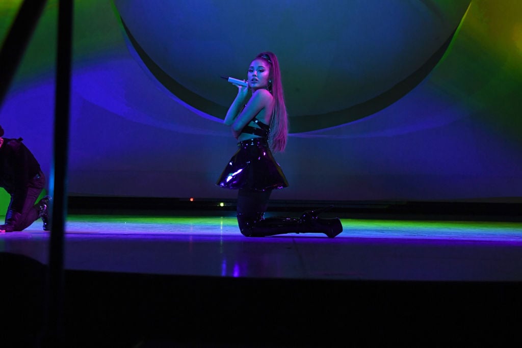 Ariana Grande performs on stage