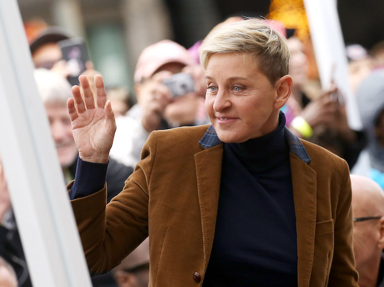 Ellen DeGeneres smiling and waving