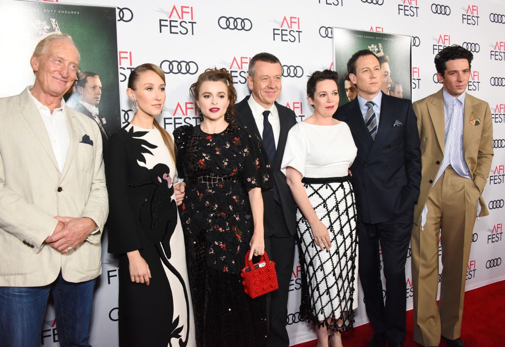 The cast of Netflix's 'The Crown' with show creator Peter Morgan (center)