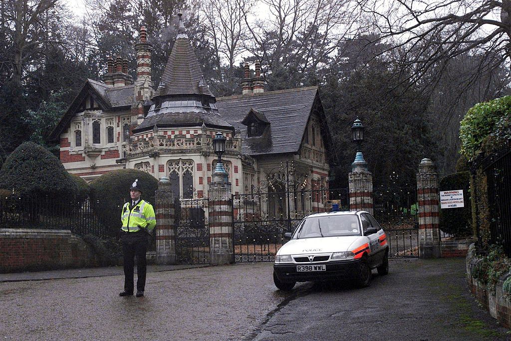 The scene outside George and Olivia Harrison's Friar Park home after they were attacked by an intruder.