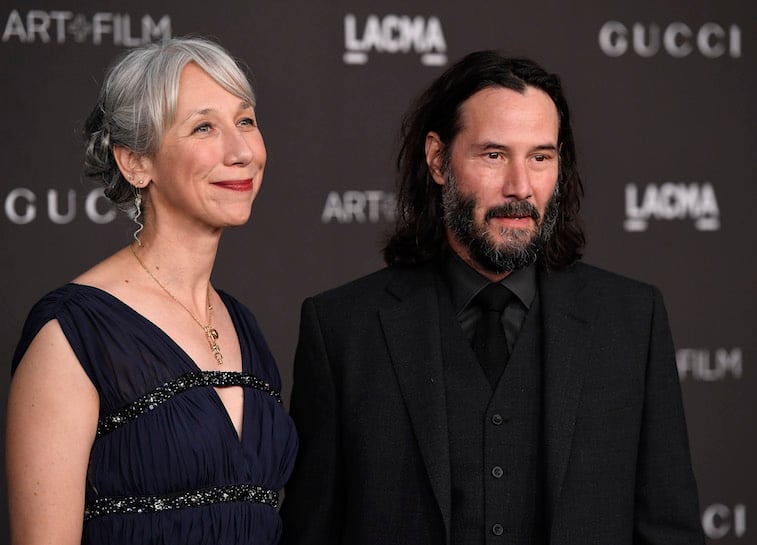 Keanu Reeves and Alexandra Grant on the red carpet