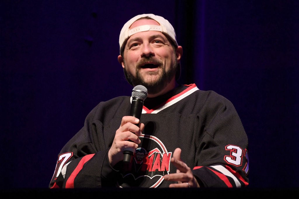 Kevin Smith speaking at a recording for his podcast. 