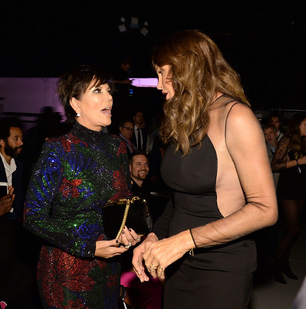 Kris Jenner and Caitlyn Jenner at a fashion show