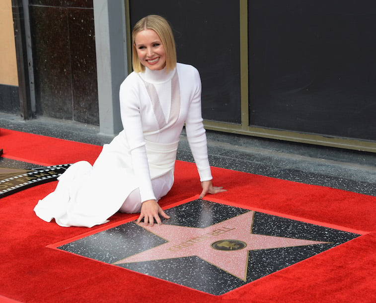 Kristen Bell next to her Hollywood star