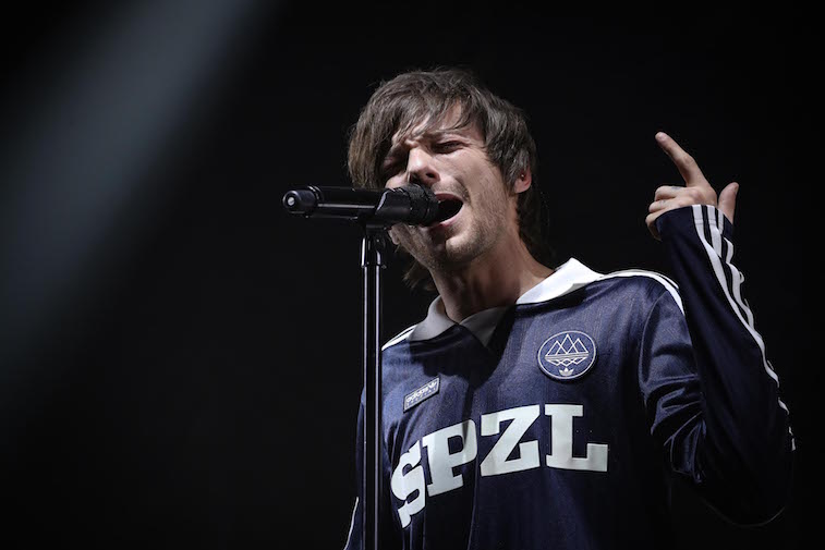 Louis Tomlinson performs onstage