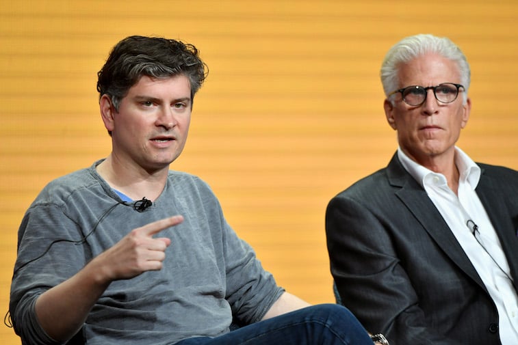 Michael Schur and Ted Danson speak onstage