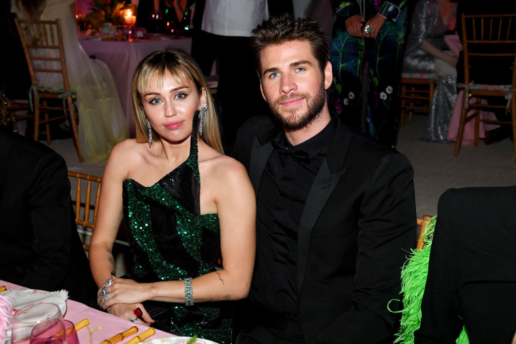 Miley Cyrus and Liam Hemsworth attend The 2019 Met Gala Celebrating Camp 