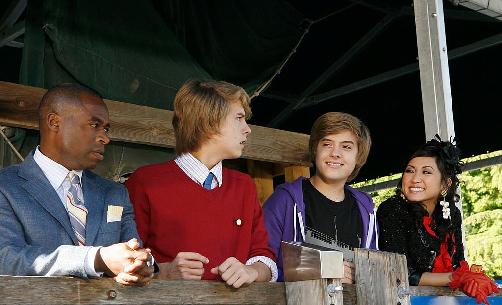 Phill Lewis, Cole Sprouse, Dylan Sprouse, and Brenda Song on set of The Suite Life Movie