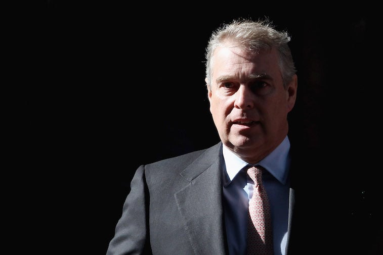 Prince Andrew leaving a building
