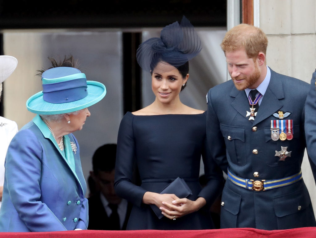 Queen Elizabeth II, Meghan Markle, and Prince Harry