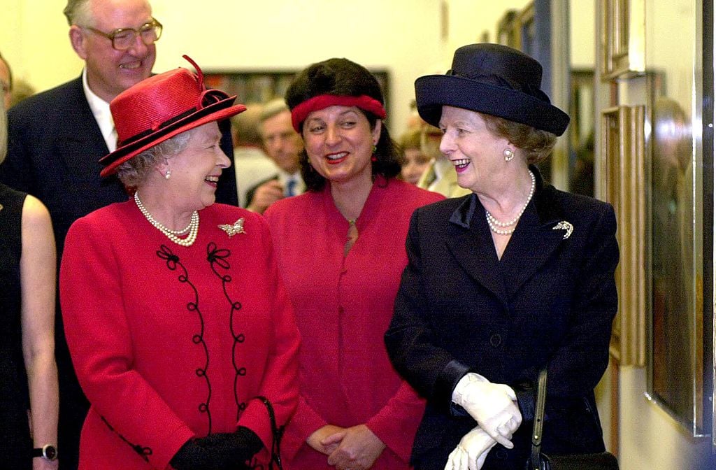 Britain's Queen Elizabeth II (left) chats with former Conservative Prime Minister Baroness Thatcher while opening a new wing of the National Portrait Gallery in London 04 May 2000