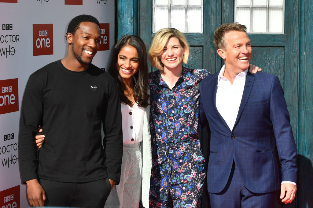 Doctor Who cast (Tosin Cole, Mandip Gill, Jodie Whittaker, and Bradley Walsh). The cast except for Walsh surprised a fan at BBC's Children in Need show.