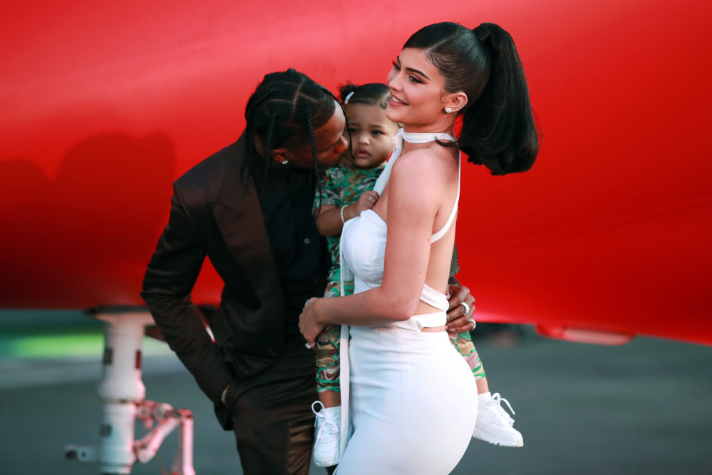 Travis Scott, Stormi Webster, and Kylie Jenner on the red carpet