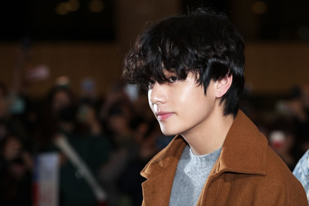 V of boy band BTS is seen on departure at Gimpo International Airport on November 21, 2019