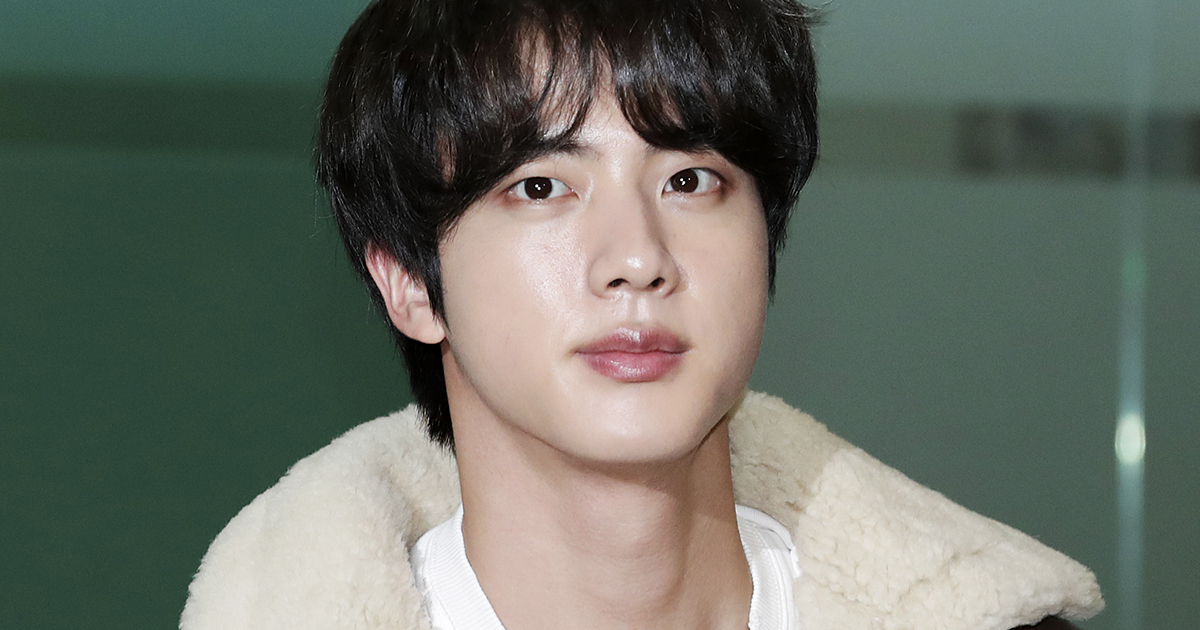Jin of BTS is seen on departure at Gimpo International Airport on November 21, 2019 in Seoul, South Korea