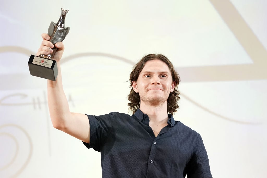 Evan Peters poses with his Giffoni Experience Award during Giffoni Film Festival 2019.