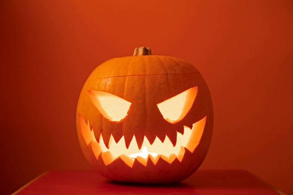 Jack o lantern on orange background