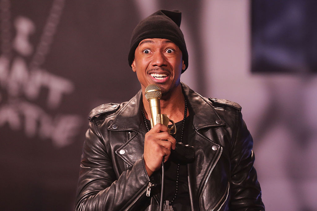 Nick Cannon performs on stage at The Ebony Repertory Theatre.
