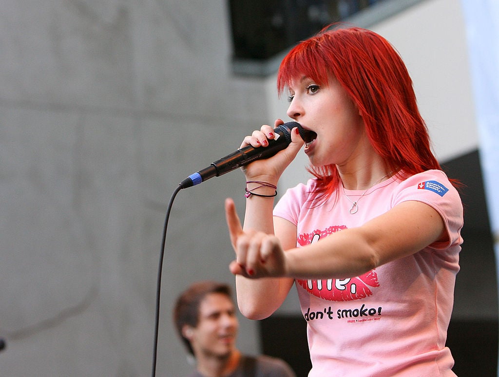 Hayley Williams of Paramore performs onstage as part of the 'Twilight' autograph event at a Hot Topic in Hollywood, 2008. 