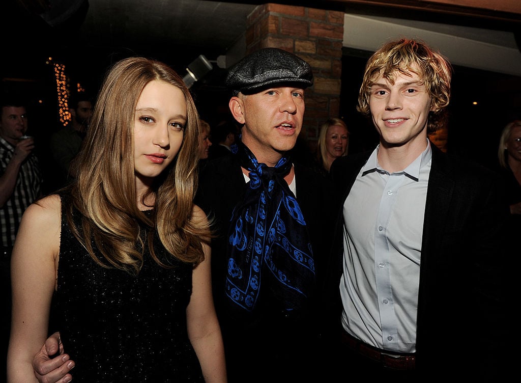 Taissa Farmiga (Violet), creator Ryan Murphy, and Evan Peters (Tate) pose at the after-party for FX's "American Horror Story: Murder House' premiere.