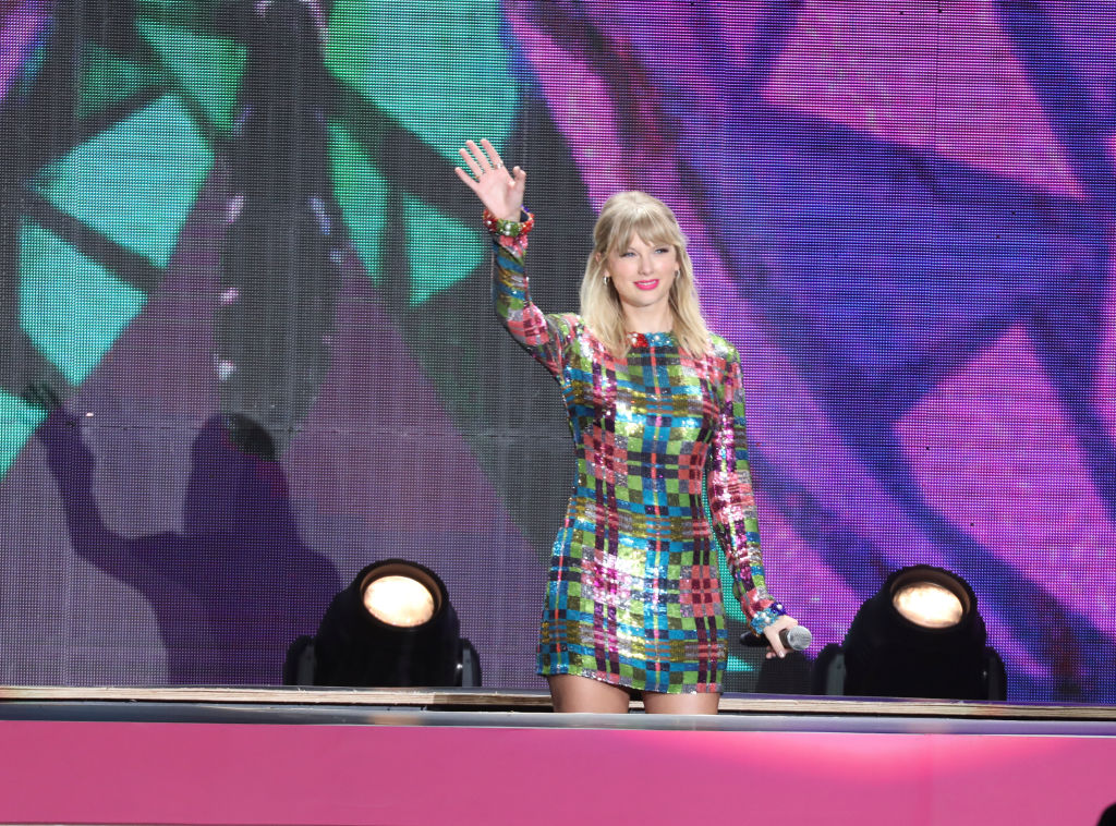 Taylor Swift waving to fans at Tianhe Sports Center in Guangzhou, Guangdong Province of China.
