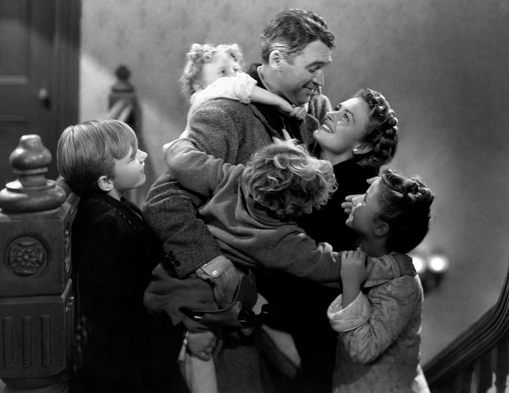 James Stewart, Donna Reed, Carol Coombs, Jimmy Hawkins, Larry Simms and Karolyn Grimes in 'It's A Wonderful Life'