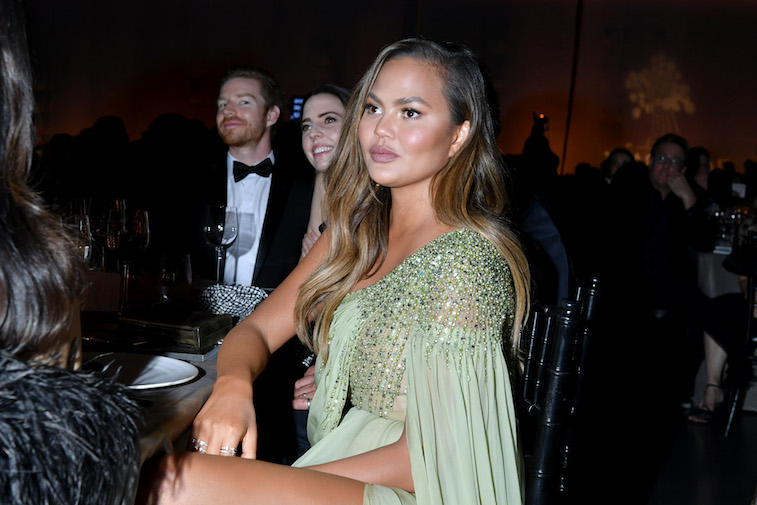 Chrissy Teigen at a gala reception