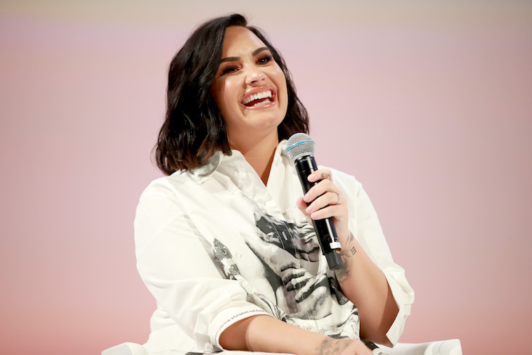 Demi Lovato speaks onstage