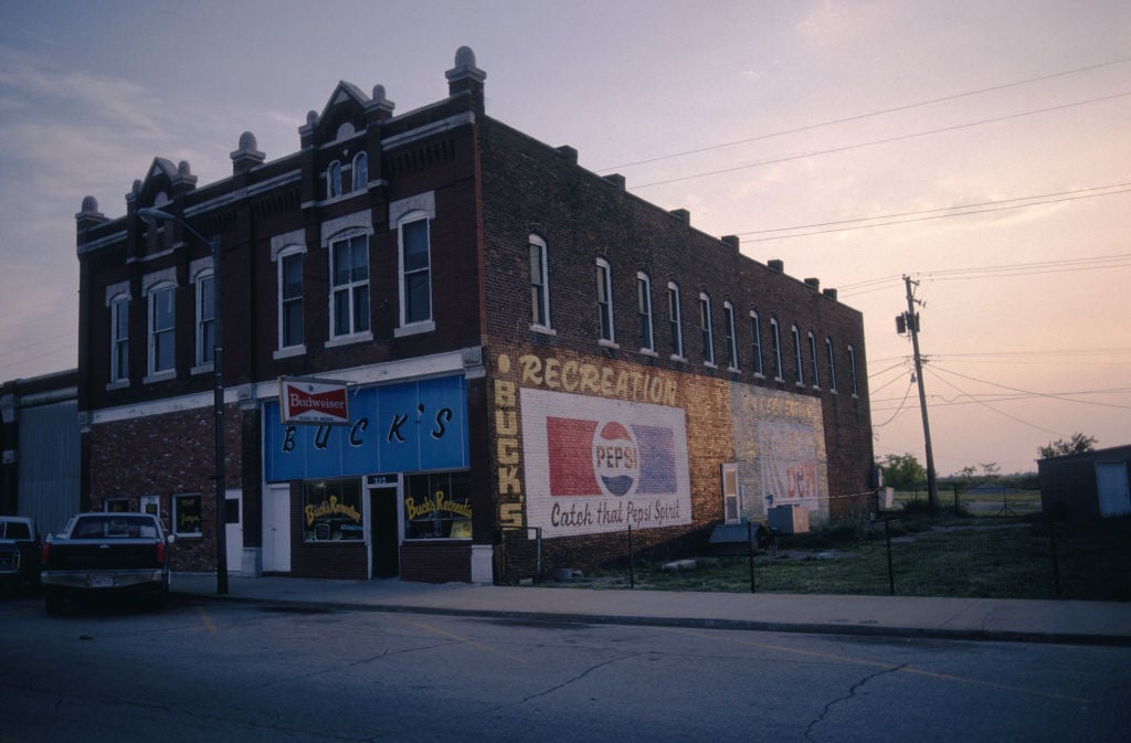 Pepsi and Budweiser signs outside Buck's Recreation in the city of Galena, Kansas, 1988.