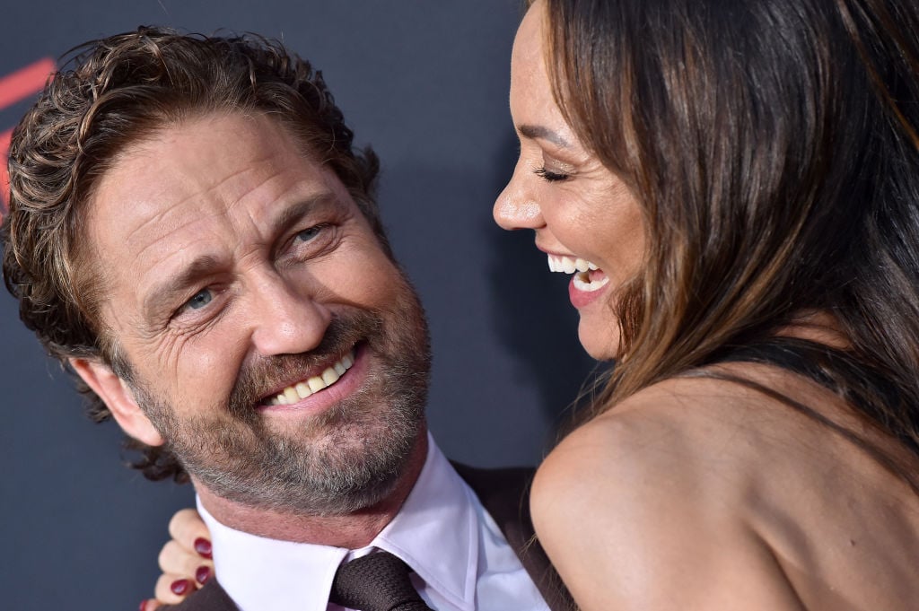 Gerard Butler poses at the premier of 'Angel Has Fallen' with Morgan Brown