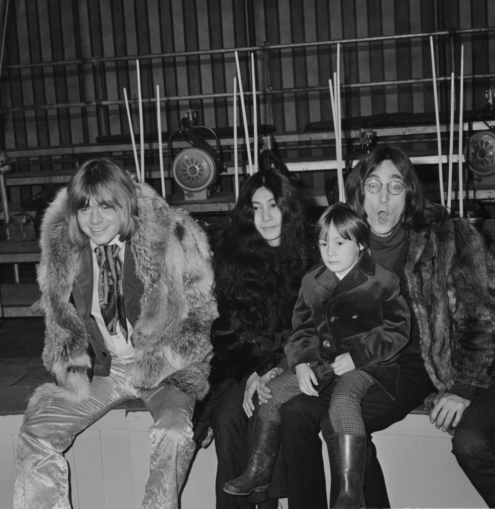 left to right: Musician Brian Jones, Yoko Ono, 5-year-old Julian Lennon, and John Lennon