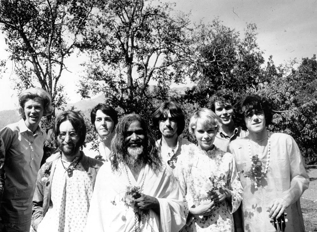 Maharishi Mahesh Yogi with members of the Beatles and other famous followers